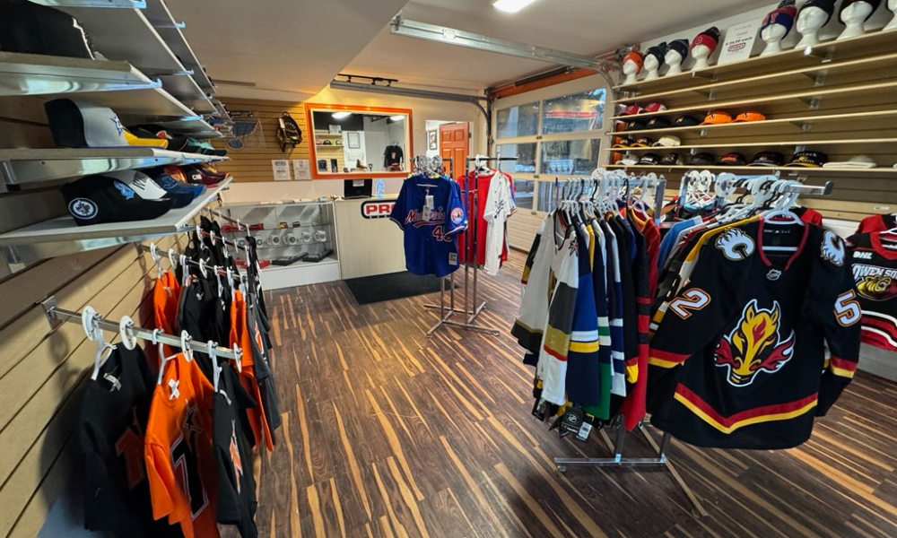 Store picture with sports jerseys, shirts and hats